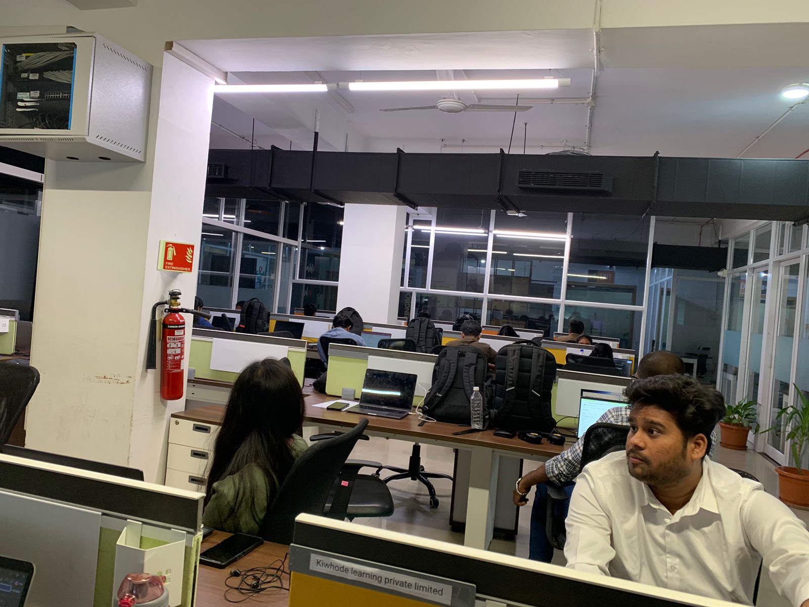 Participants working on the hackathon floor